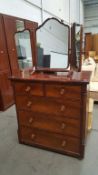 Two over three chest of drawers on castors with dressing table mirror