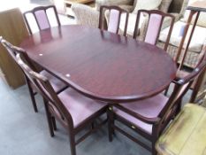 Mahogany dining table with six dining chairs