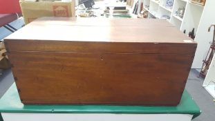 A Wooden Storage Box with Badminton Racket inside