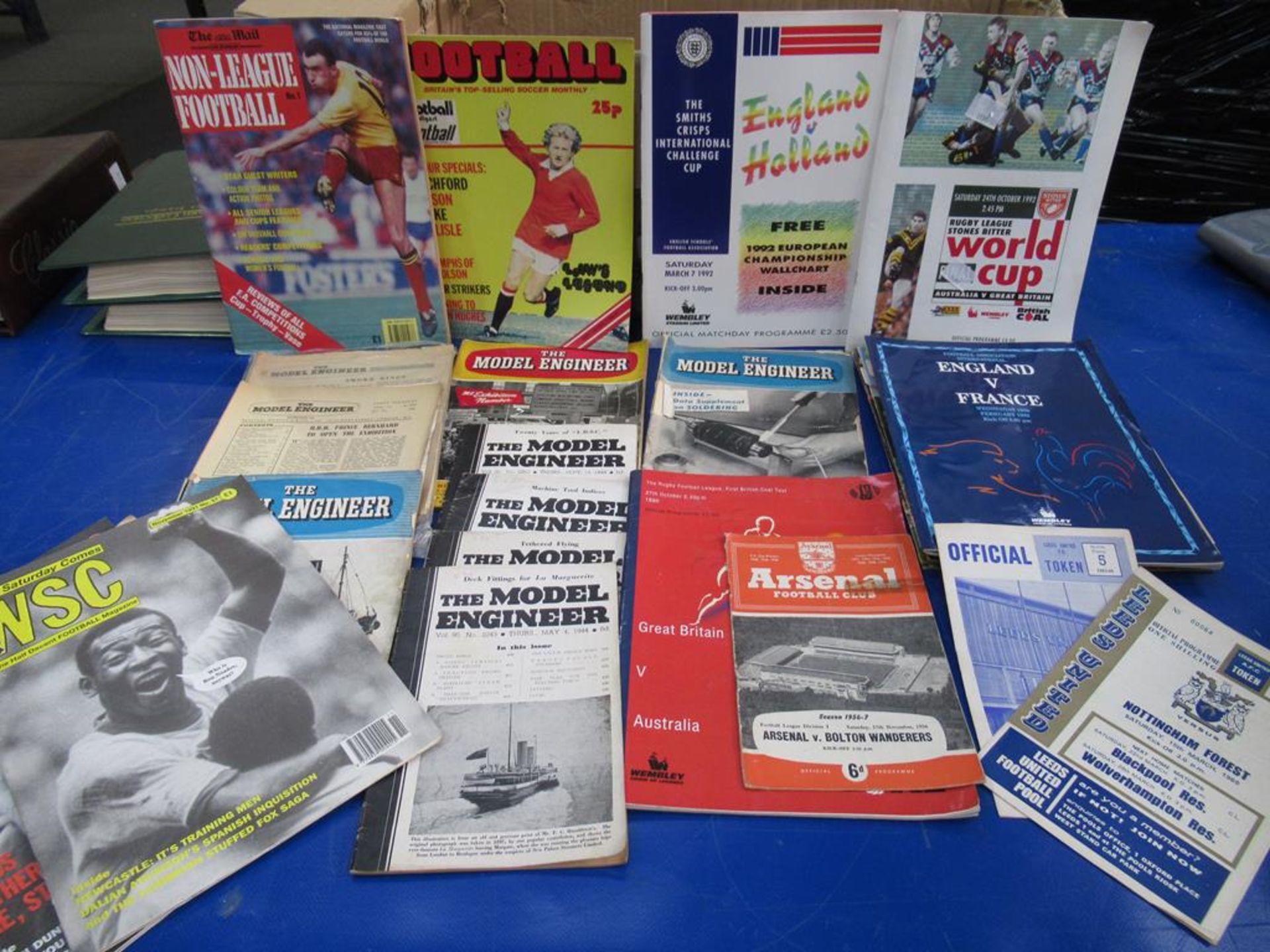 A Box to contain a large quantity of Football and some Rugby Programmes