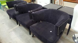 Three upholstered tub chairs