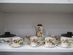 A Shelf containing a H. Aynsley floral Tea/Coffee Service