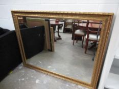 Gilt framed bevelled edged mirror