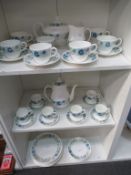 A Wedgwood Clemantine Pattern Six Place Settings Tea and Coffee Set
