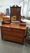 A Dressing Table with four drawers and mirror