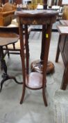 An Edwardian Plant Stand with decorative painting and an Edwardian Side Table