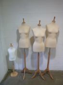 Three soft mannequins together with another