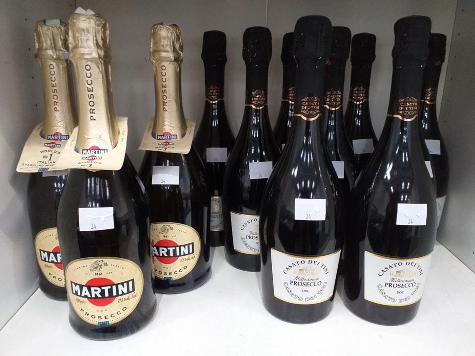 Three bottles of Martini Prosecco D.O.C. and nine bottles of Casato Dei Tini Millesimato Prosecco D.