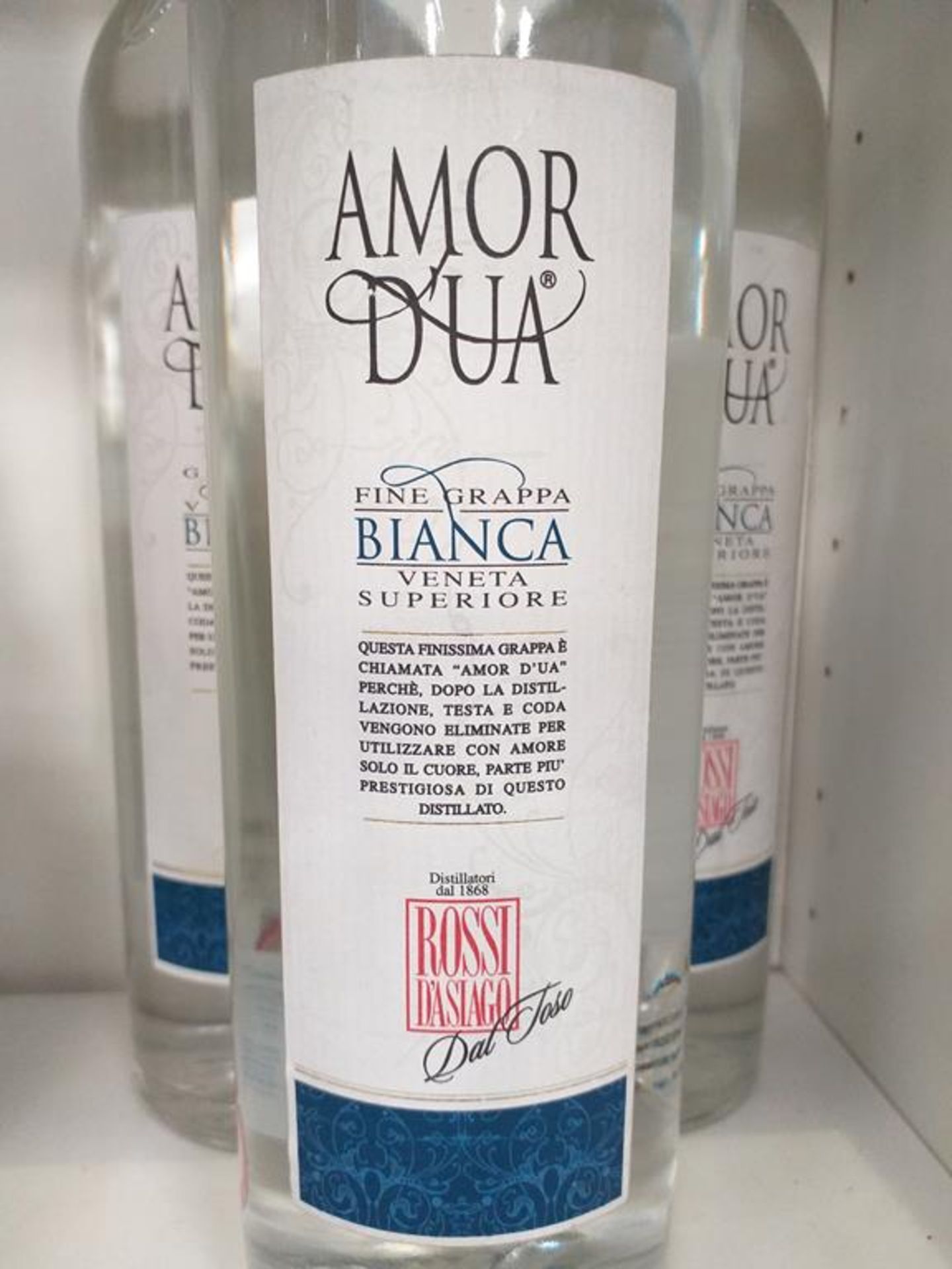 Three bottles of Amor D'ua Bianca Fine Grappa, a bottle of Iseo Sambuca and a bottle of '12 Ouzo' - Image 6 of 7