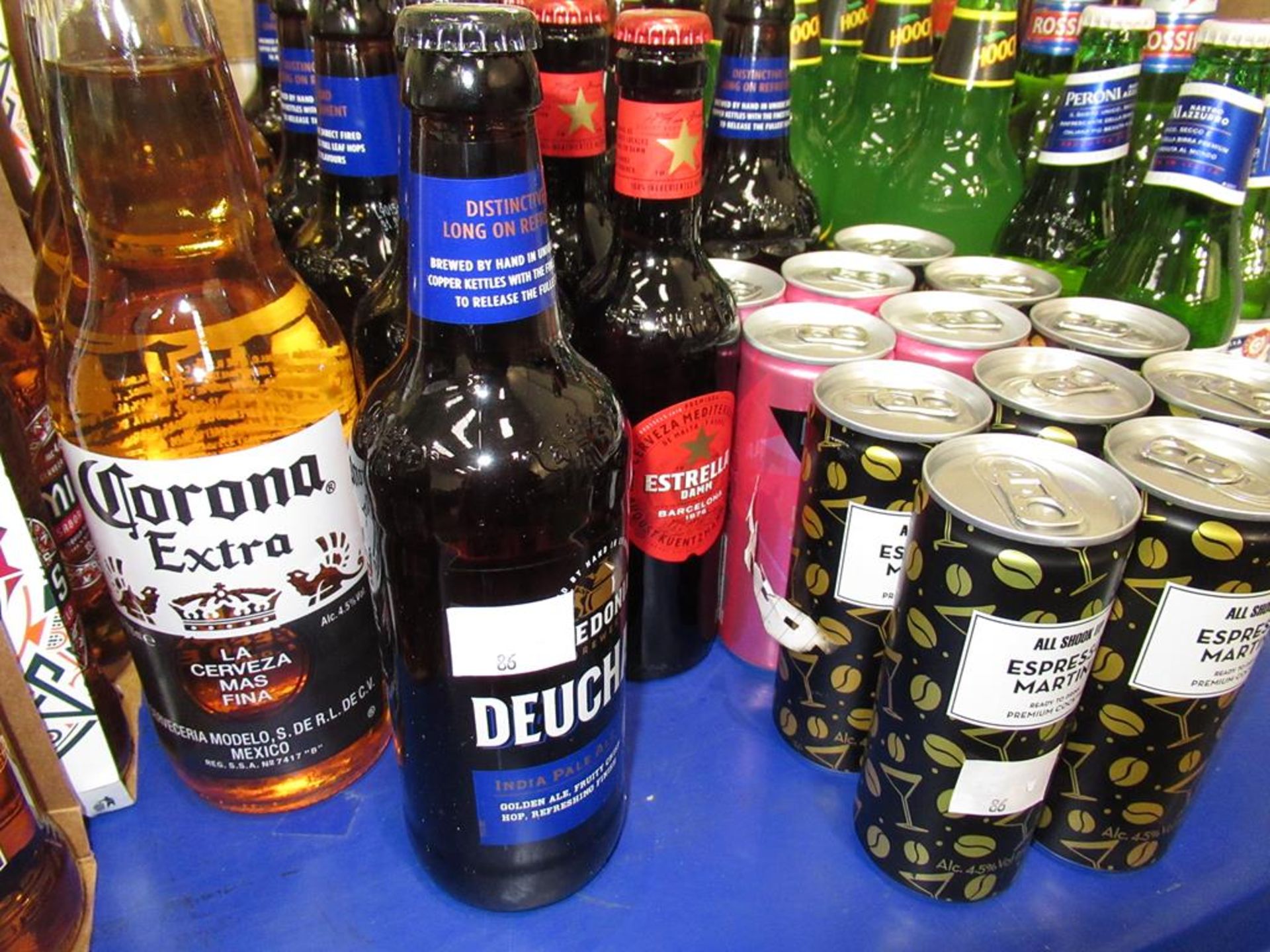 A Qty of bottles drinks to include Theakston Light, Wainwright beer, Newcastle Brown Ale, Hooch, Cor - Image 8 of 8