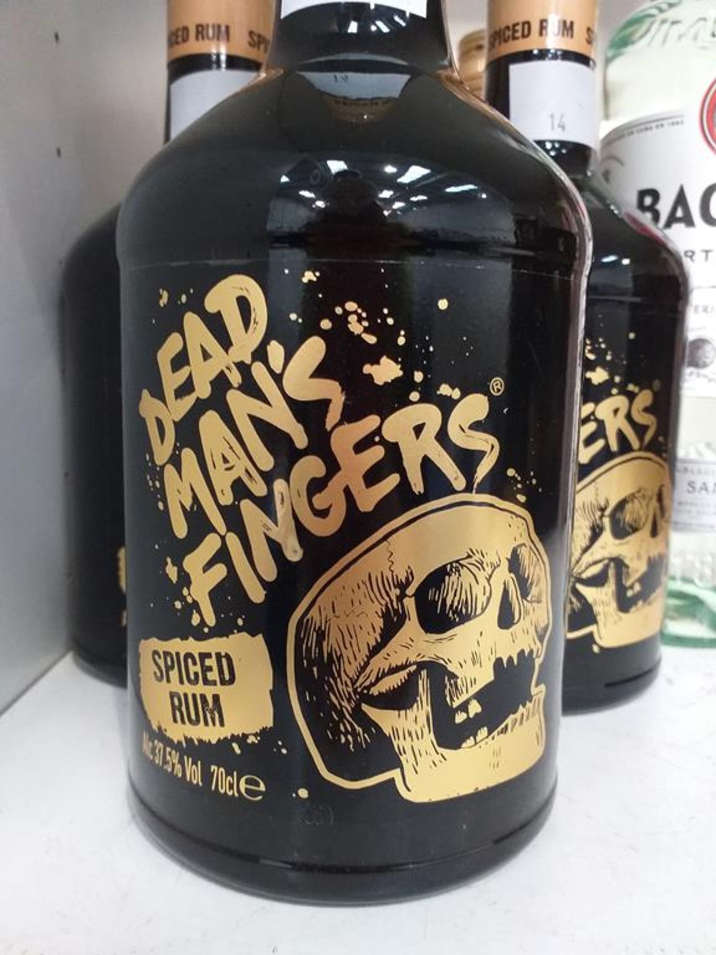 Five bottles of Dead Man's Fingers Spice Rum and a bottle of Bacardi Carta Blanca white rum - Image 2 of 5