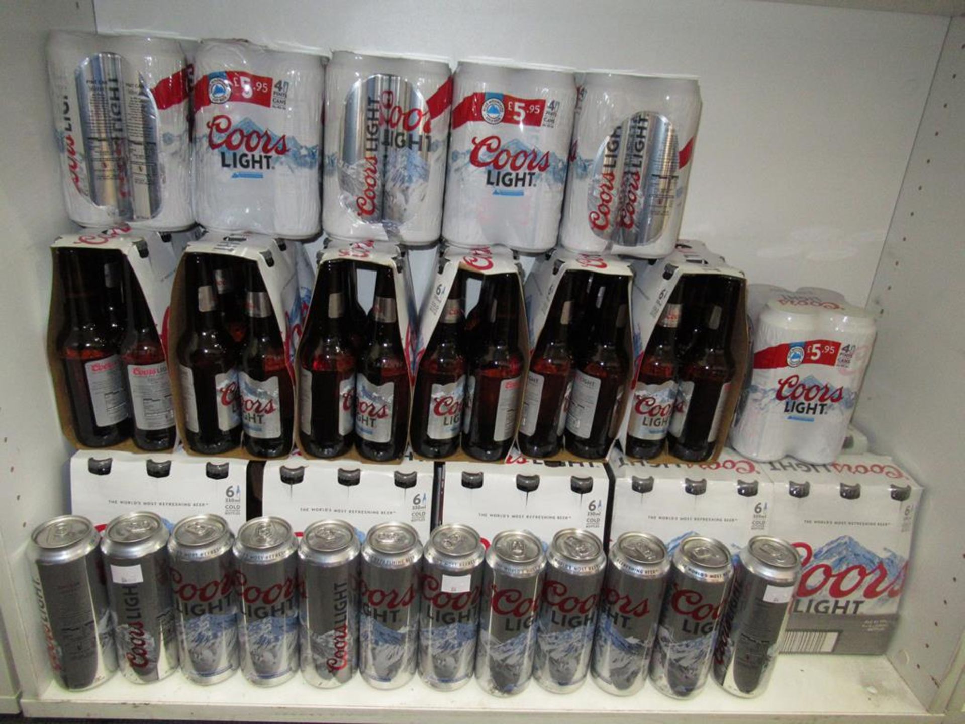 A Qty of Coors Light Beer bottles & cans