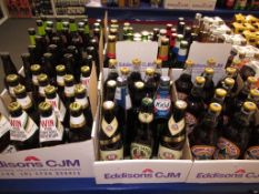 A Qty of bottles drinks to include Theakston Light, Wainwright beer, Newcastle Brown Ale, Hooch, Cor