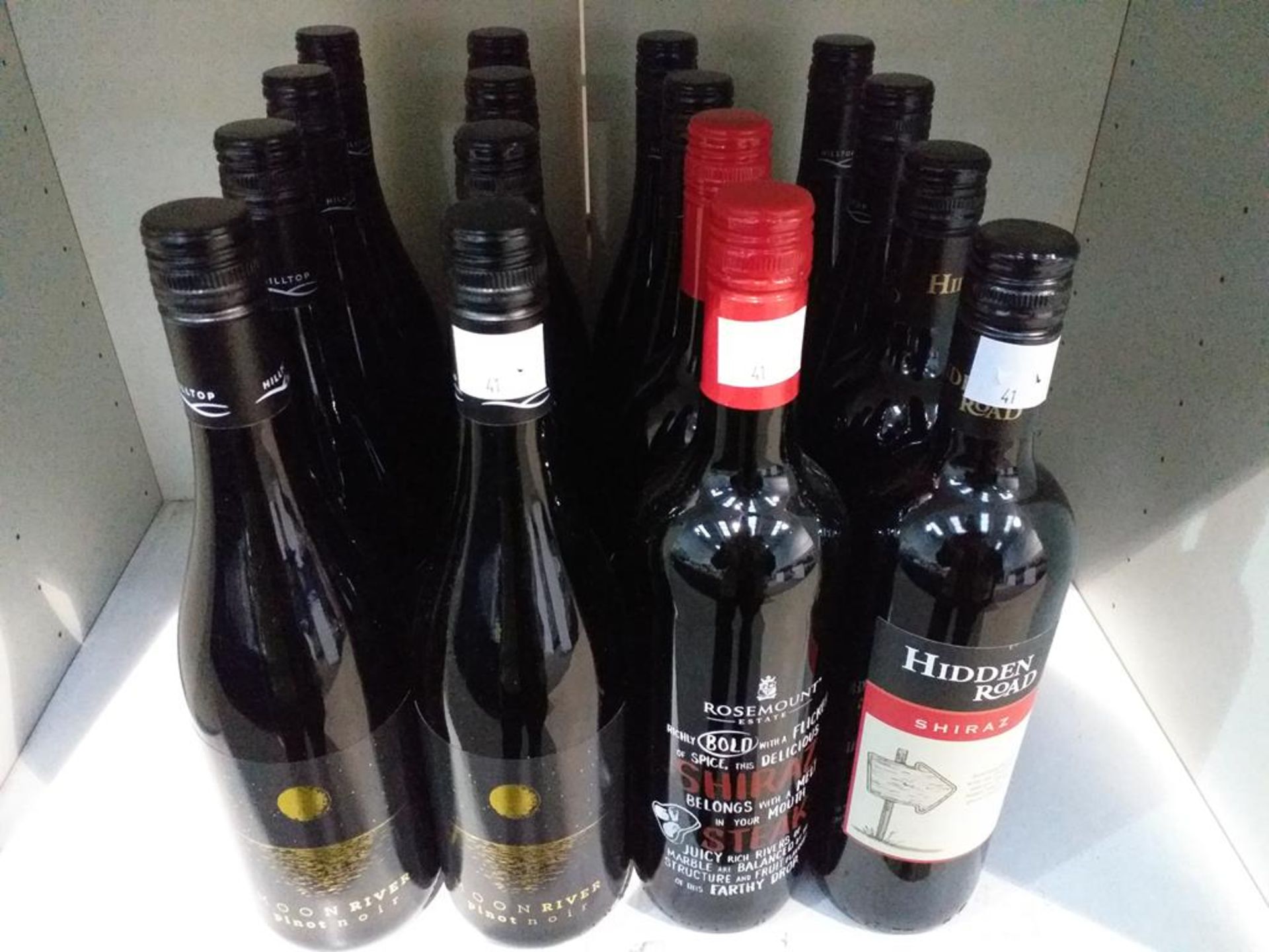 Twelve bottles of Hilltop Moon River Pinot Noir, two bottles of Rosemount Estate Shiraz Red Wine and