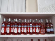 Twenty one bottles of Blossom Hill Cherry Flavour Spritz Rosé wine, two bottles of Makula Pomula Pom