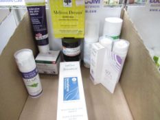 A box of mixed items to include Bio skin Derma Spray, Colloidal Silver Skin treatment, Melissa Dream