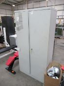 A 2 door Metal Filing Cabinet. Please note there is a £5 plus VAT Lift Out Fee on this lot.