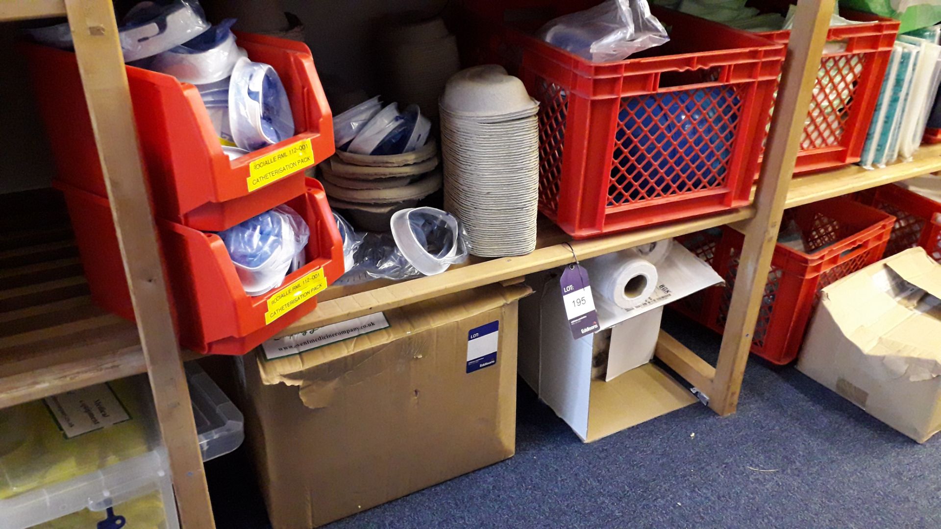 Contents of 2 shelves containing various medical e