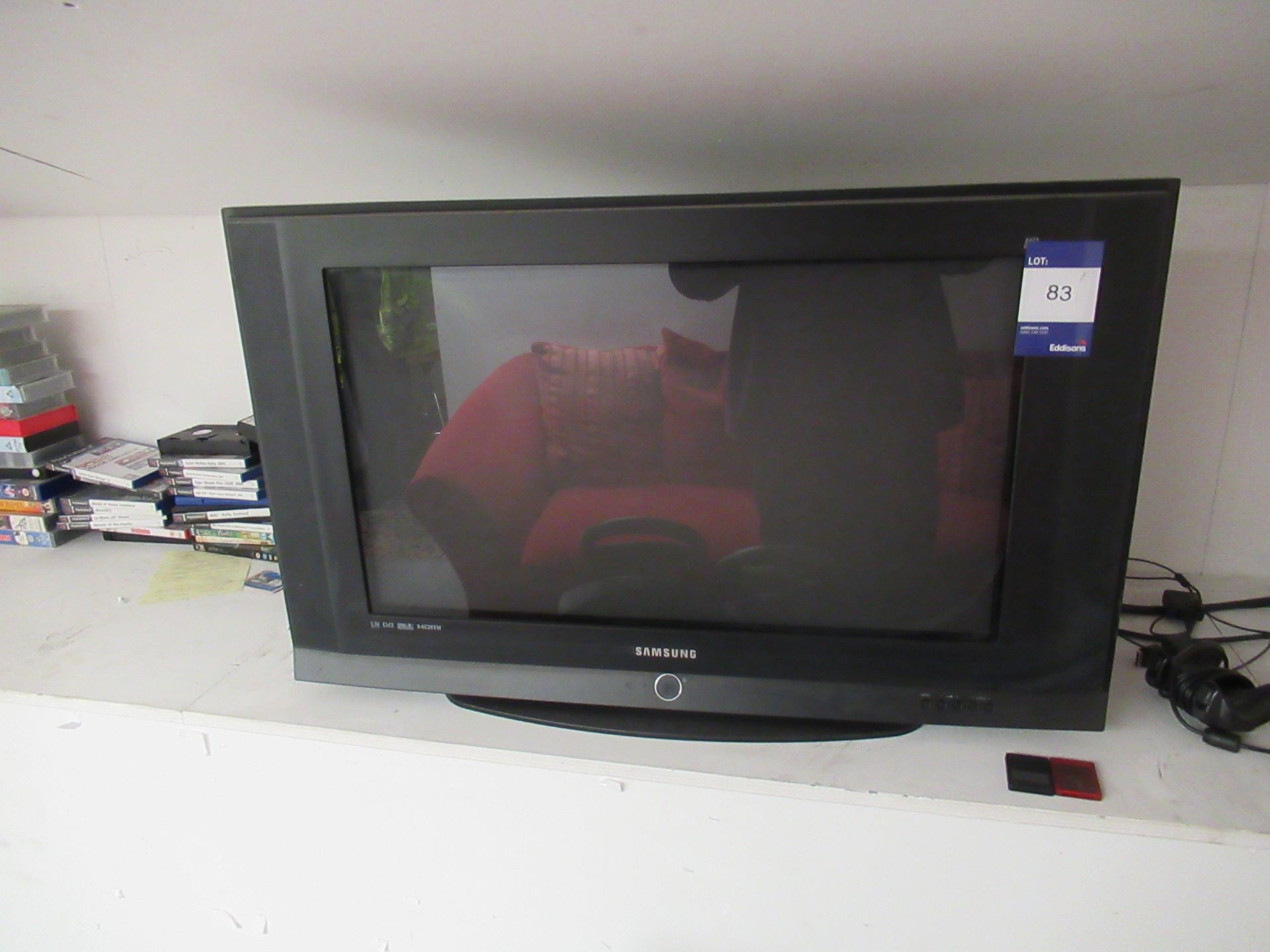 Samsung 30” TV with Playstation, Various Controlle