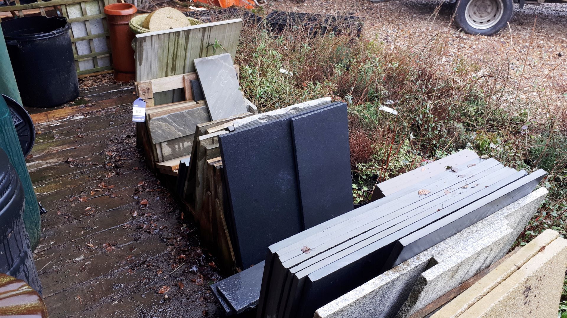 Assortment of paving to decking area, including slate *Please note, there are no loading