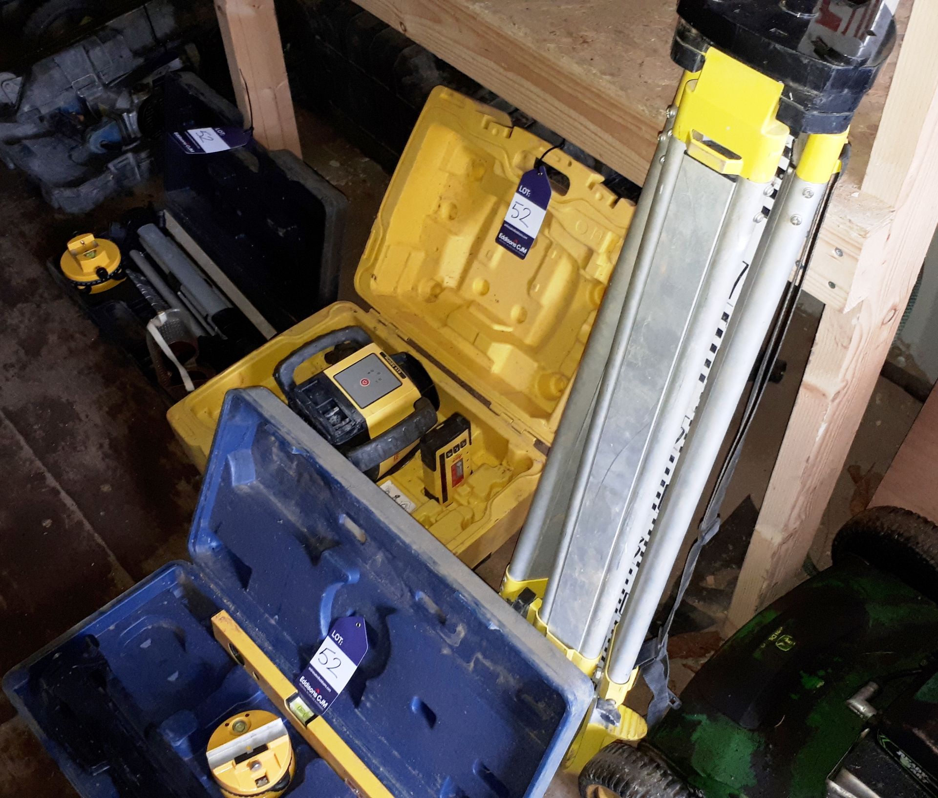 Assortment of site surveying equipment, including Leica Rugby 610 laser, Power Master laser level