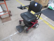 An Eden Mobility Powered Wheelchair, comes with Charger