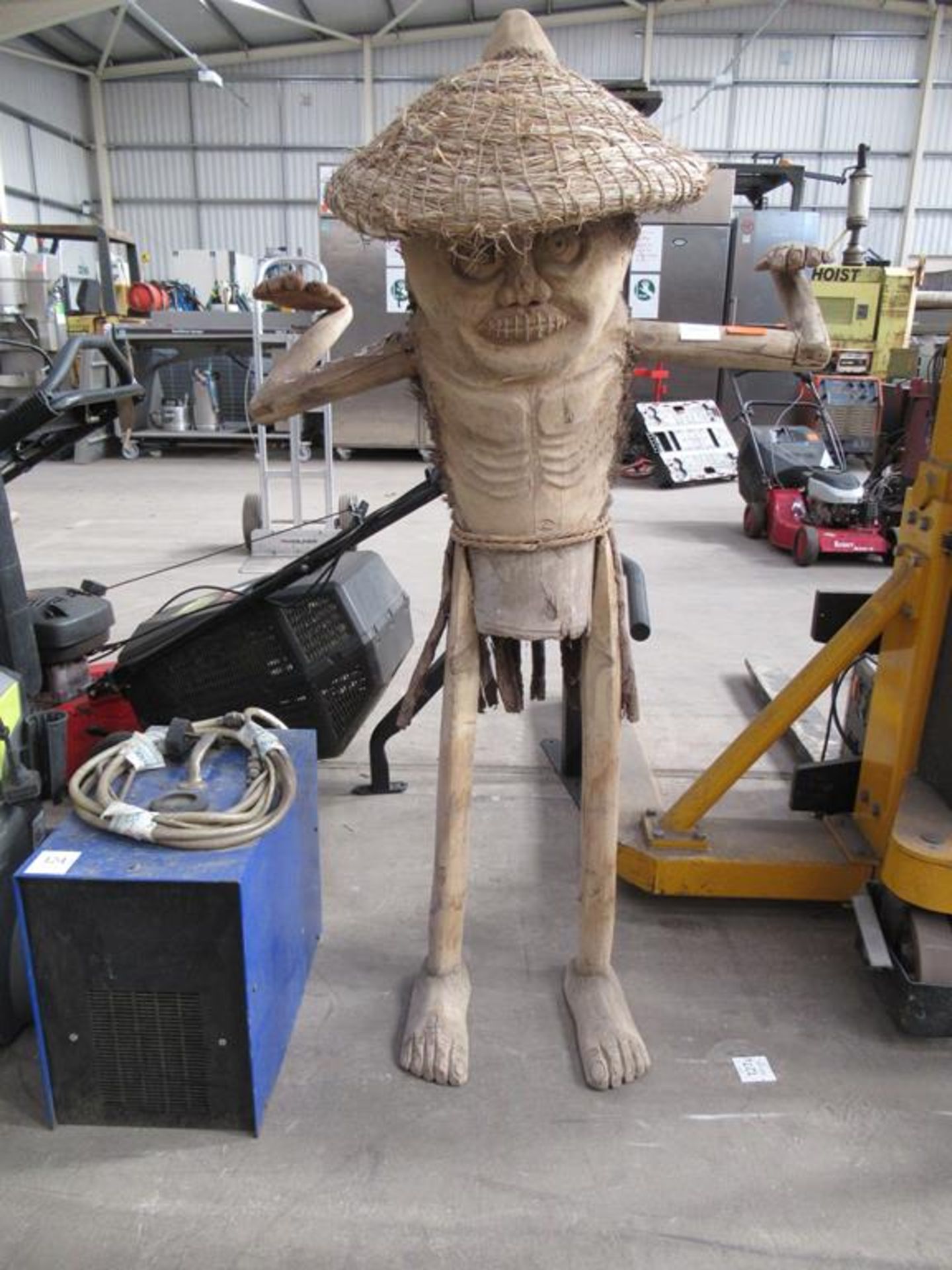 A Wooden Garden Figure