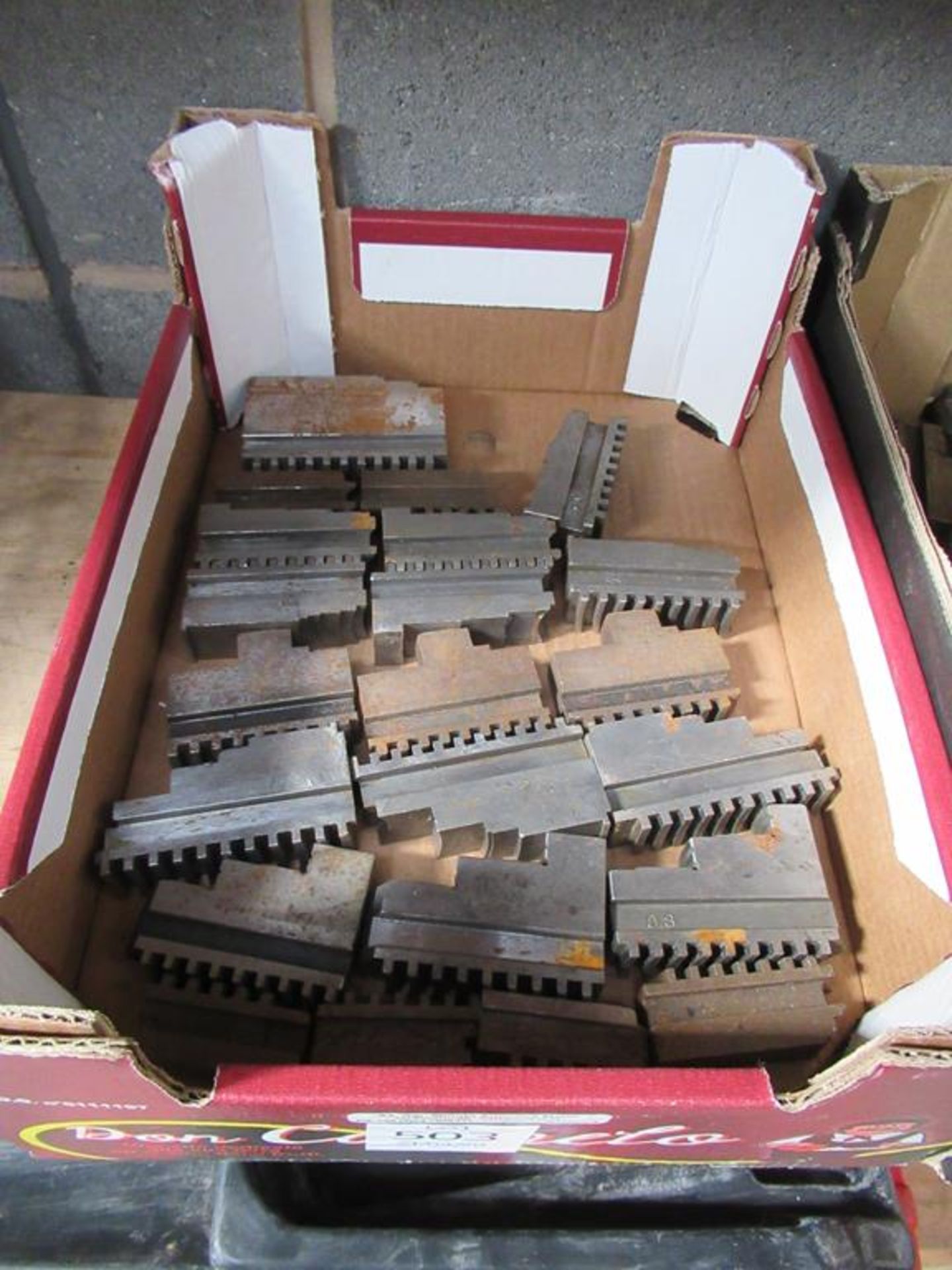 A box of various Machine Clamps
