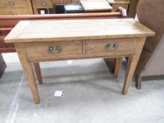 A wooden effect two drawer console table (W115cm)