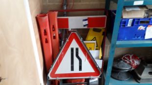 Various site safety signs and barriers.