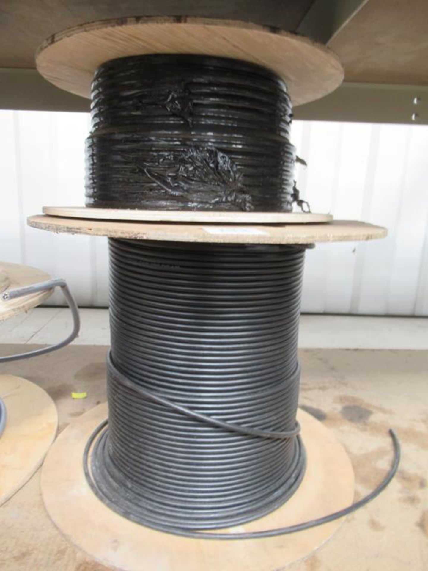 A Roll of 3 Core Braided Cable and a Roll of Coaxial Cable