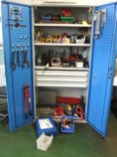 Engineers workshop cupboard with contents.