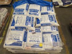 Part pallet of white de-icing salt & a part pallet of absorbent granules