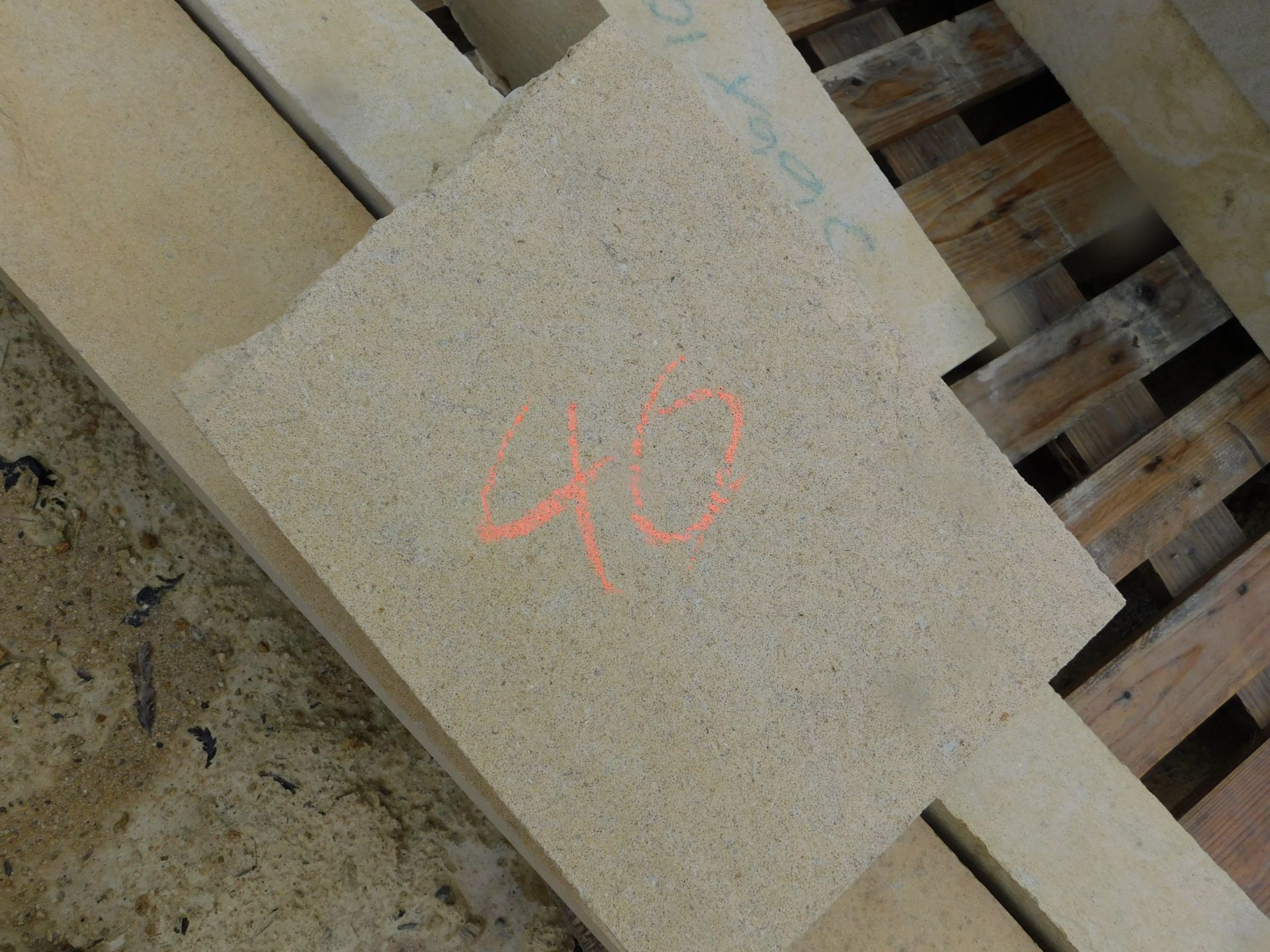 Large quantity of cut masonry stone, to right hand