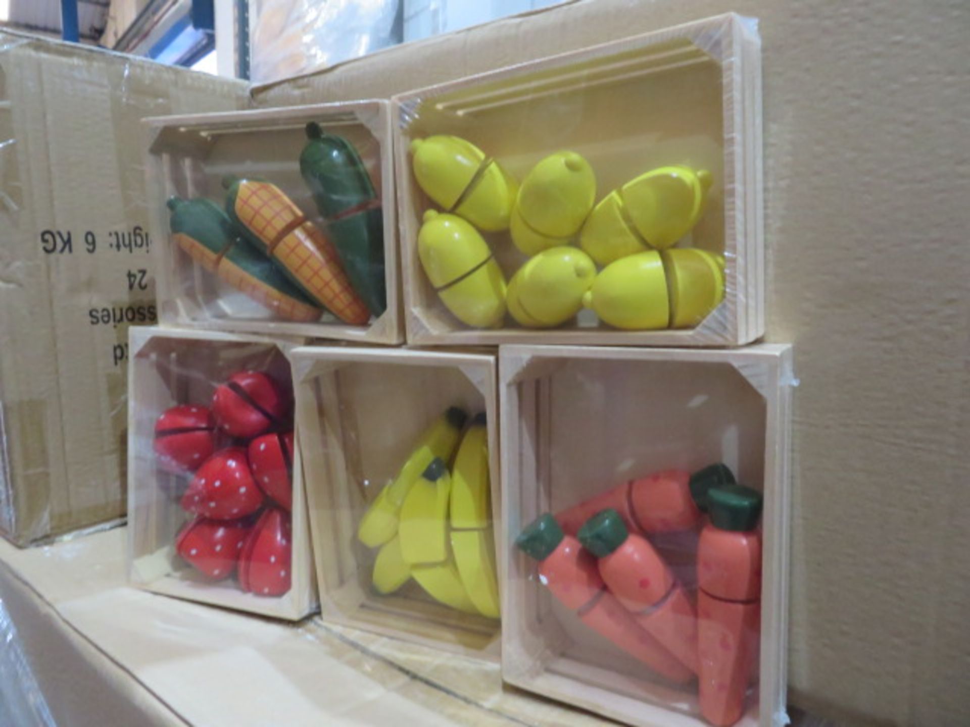 240 x SETS OF BRAND NEW PACKAGED WOODEN FRUIT ACCESSORIES IN WOODEN CRATES. SUCH AS: CARROTS,