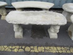 A squirrel bench with timber effect seat