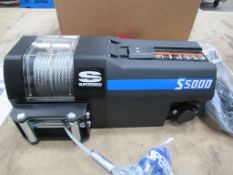 An unused 2.5T electric recovery super winch S5000 24V steel rope with manual