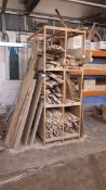 Various lengths of stripped birch wood to rack, wall, bottom bay of racking, and cage