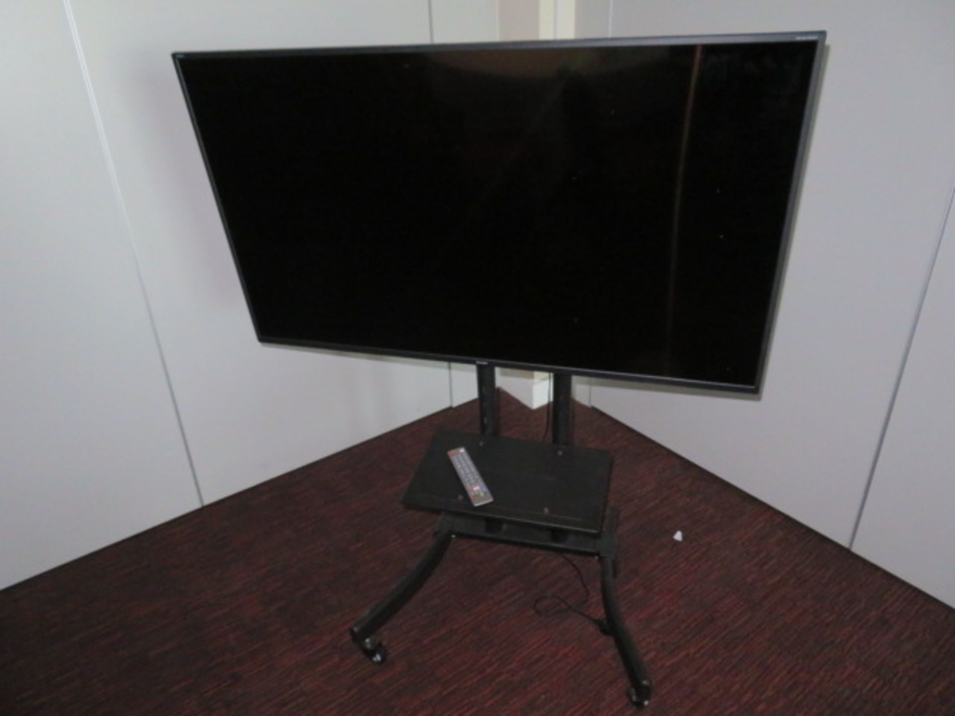 SHARP 55 INCH TV 55BJ3K WITH REMOTE AND TROLLY