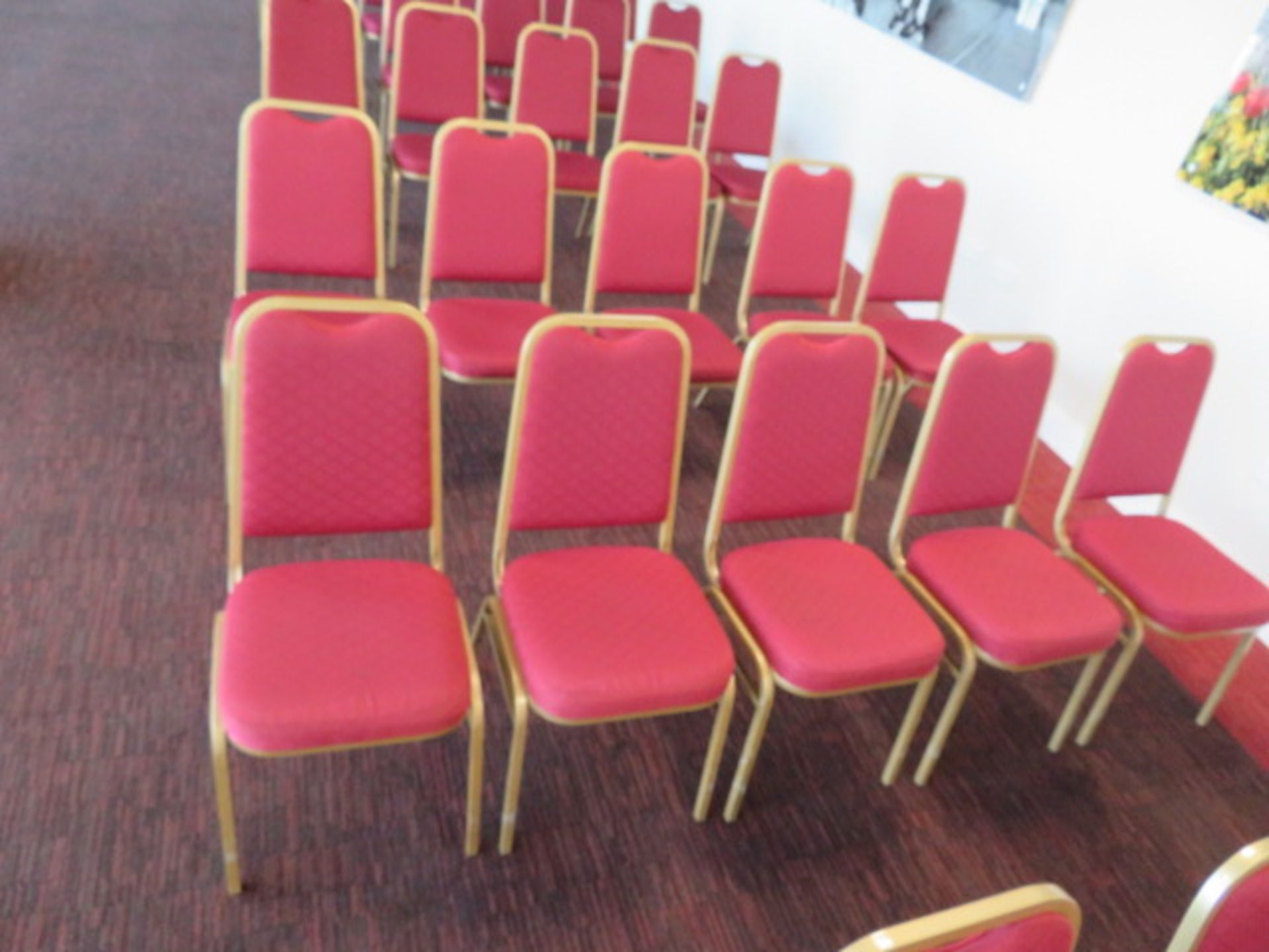 10 x STACKABLE RED CUSHIONED CHAIRS WITH GOLD OUTL