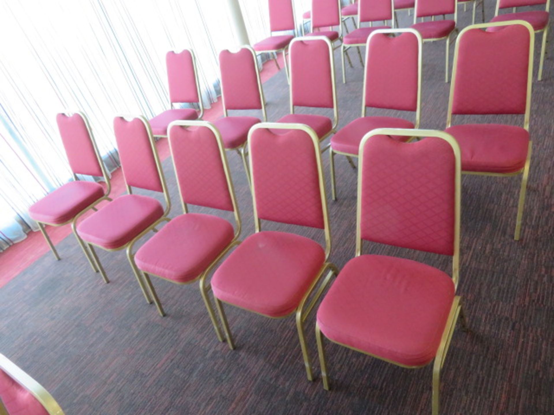 10 x STACKABLE RED CUSHIONED CHAIRS WITH GOLD OUTL