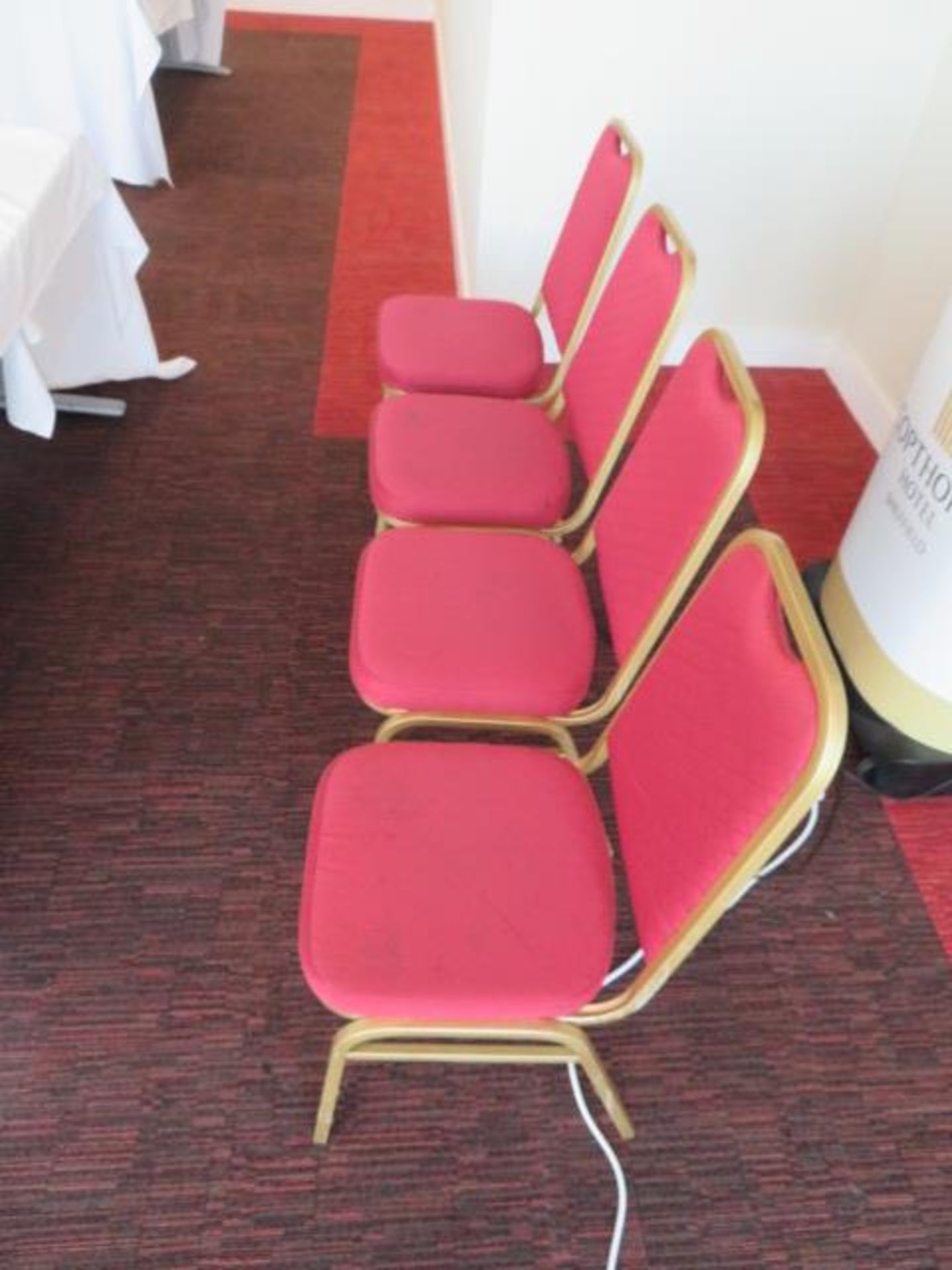 4 X STACKABLE RED CUSHIONED CHAIRS WITH GOLD OUTLI