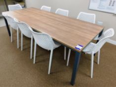 Large Laminate Table with 8 White Plastic Chairs