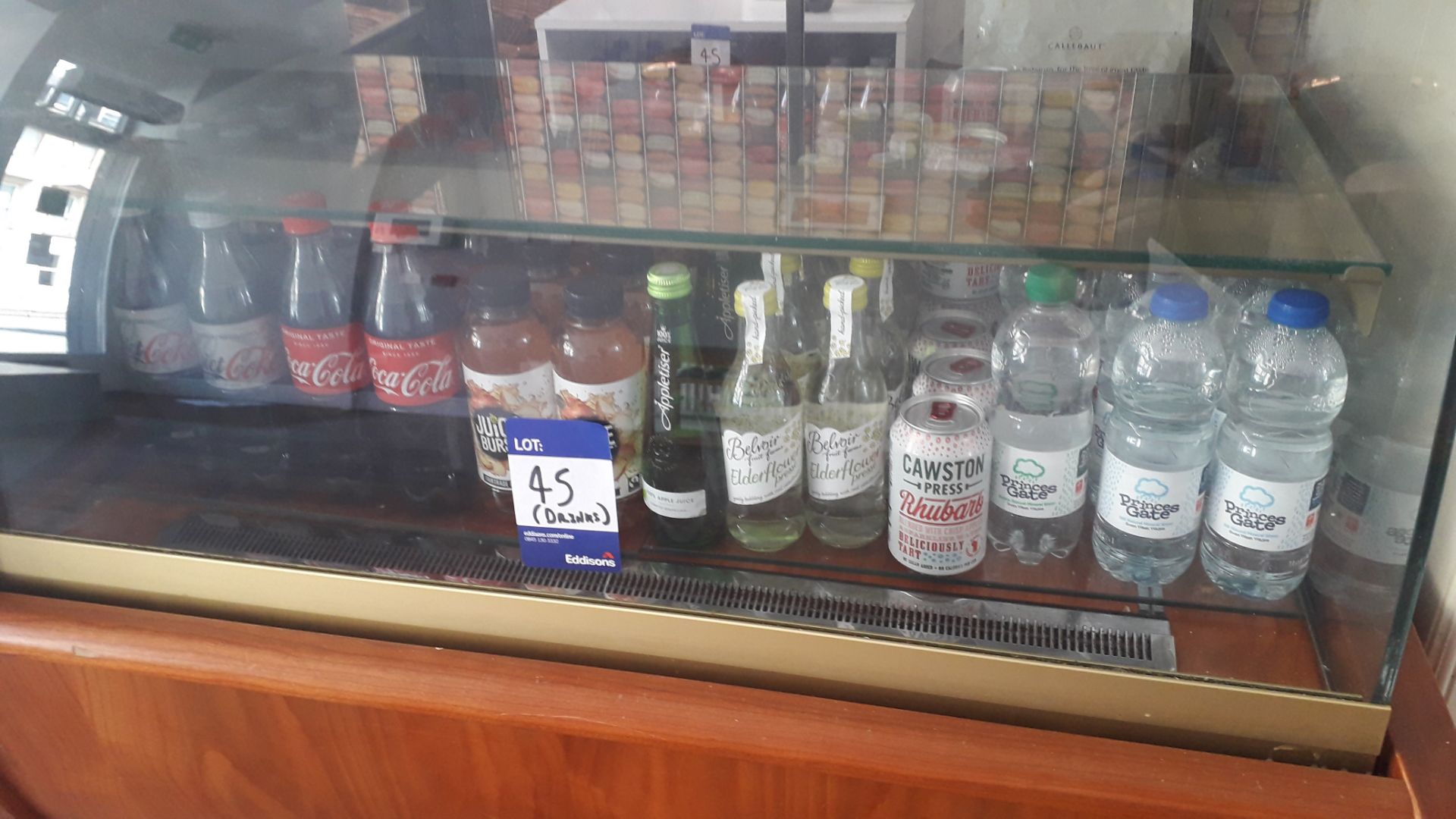 Small quantity of soft drinks and crisps to ground