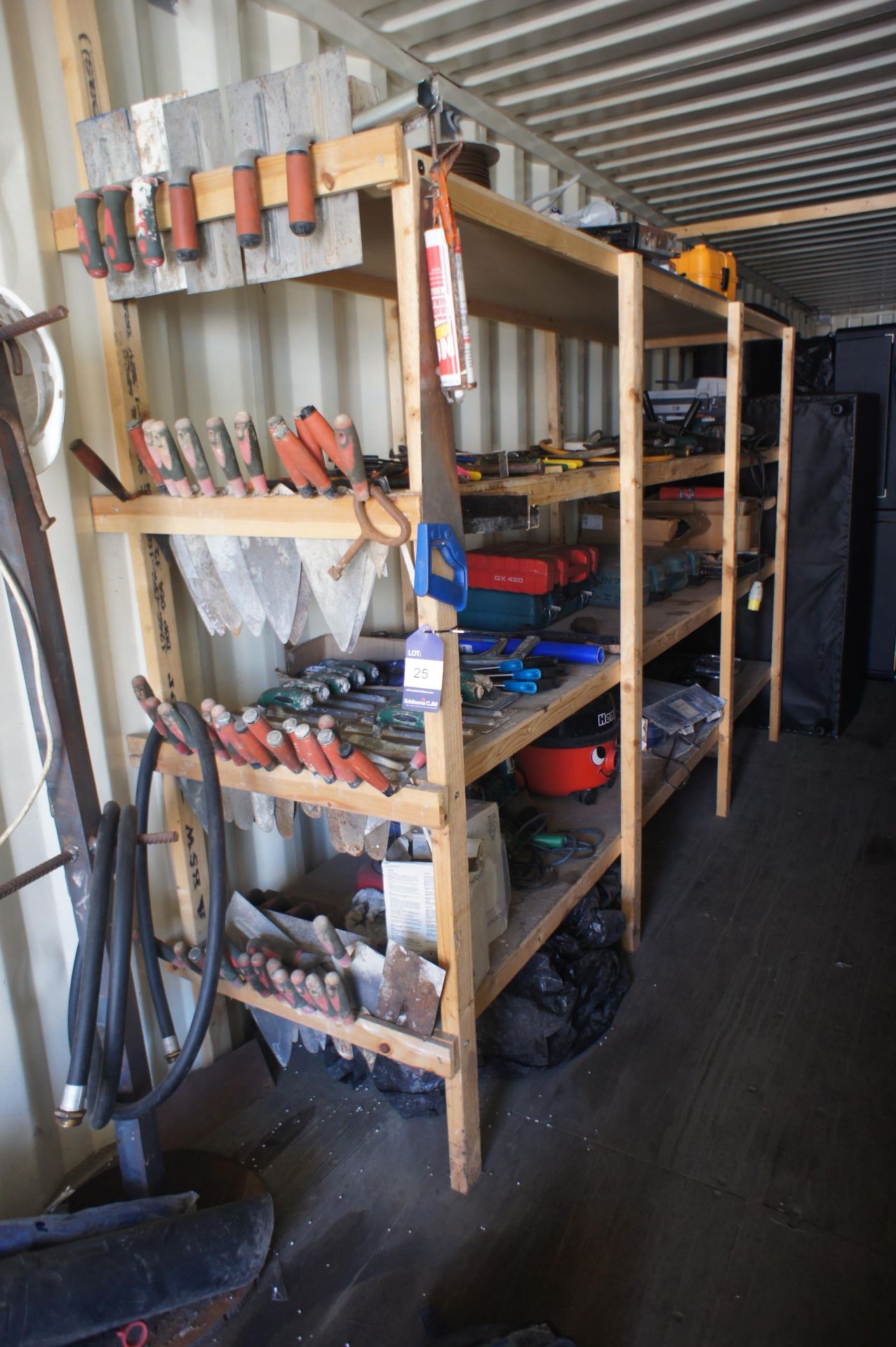 Large quantity of hand tools to wood shelving incl