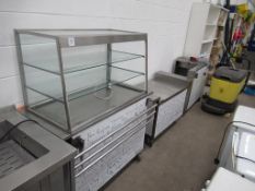 A mobile three piece servery including heated display