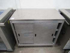 Grundy heated cupboard on castors