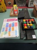 2 x pool cues and part billiard ball set, 2 x cards of darts accessories, chess set and dominos