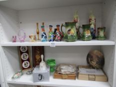 Two shelves of porcelain