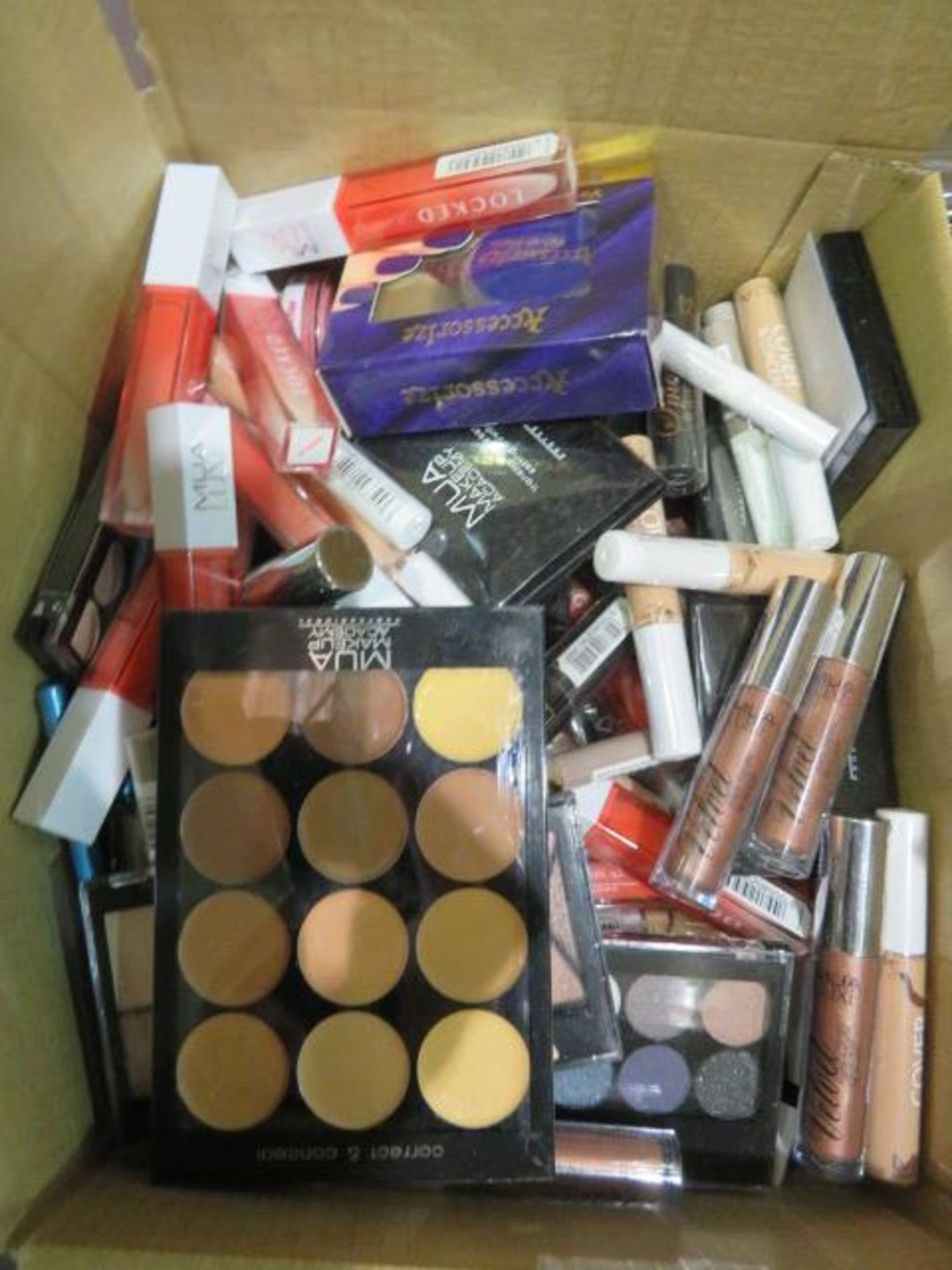 Circa. 200 items of various new make up acadamy make up to include: eye primer, locked lip primer,